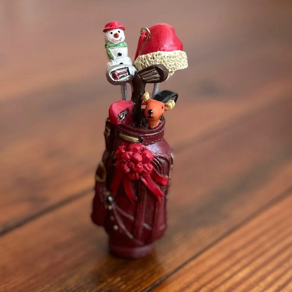 2009 red golf bag ornament w Santa hat, snowman, & clubs